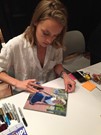 Rachel Skarsten signing proof