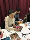 Raquel Pomplun signing proof