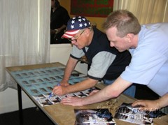 signing photo