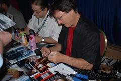 signing photo