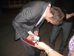 signing photo