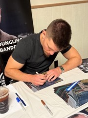 signing photo