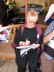 signing photo