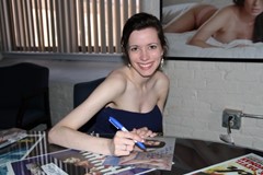 signing photo