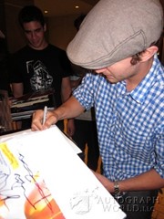 signing photo