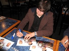 signing photo