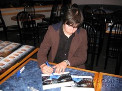 signing photo