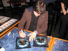 signing photo