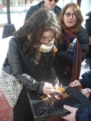 signing photo