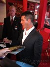 Simon Cowell signing proof