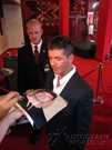 Simon Cowell signing proof