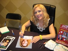 signing photo