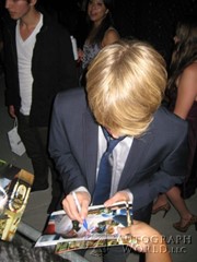 signing photo