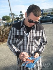 signing photo