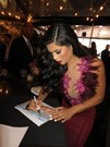 Suelyn Medeiros signing proof