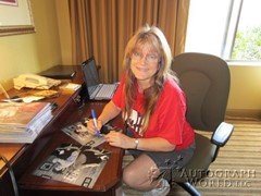 signing photo