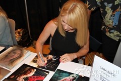 signing photo