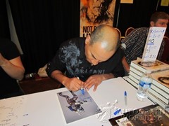 signing photo
