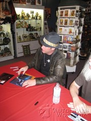 signing photo