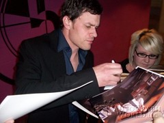 signing photo