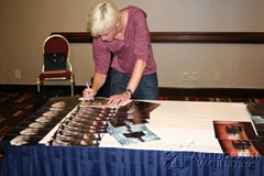 signing photo