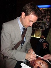 signing photo