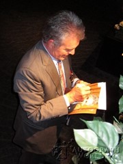 signing photo
