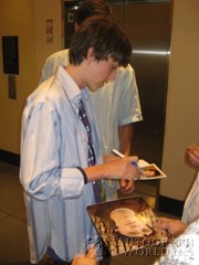 signing photo