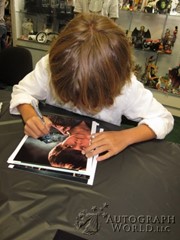 signing photo