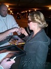 Uma Thurman signing proof
