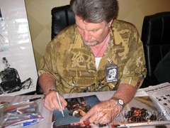 signing photo