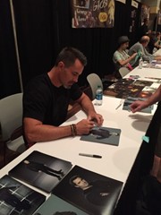 signing photo
