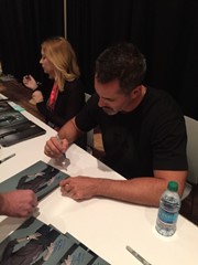 signing photo