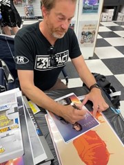 signing photo