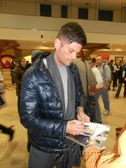 signing photo