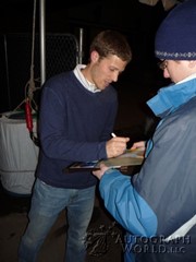 signing photo