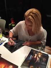 signing photo